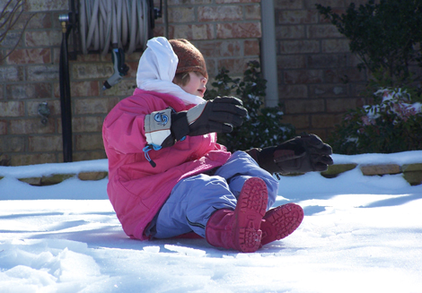 My daughter, enjoying the recent global warming in Tennessee.  (Her hands arent actually that big.)